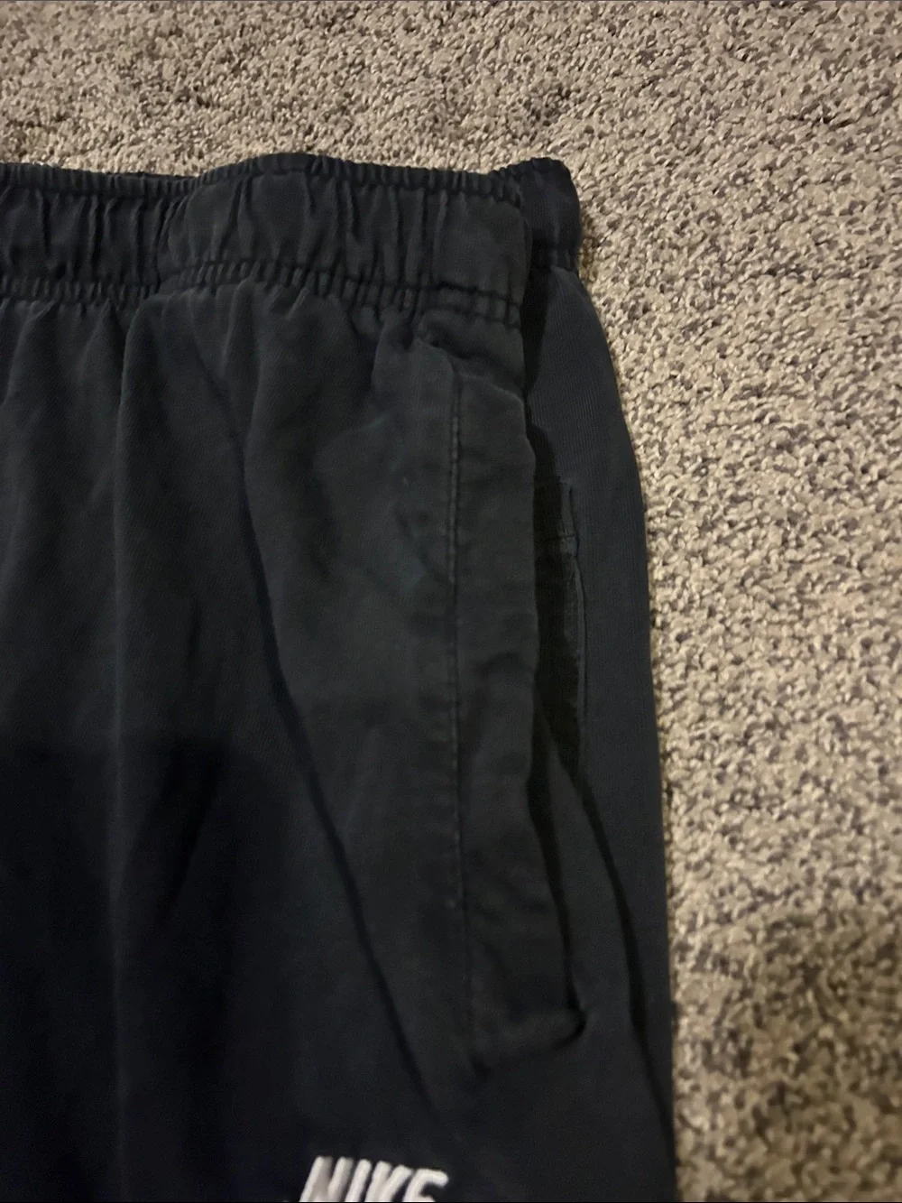 Nike Men's Black Jogger Sweatpants with White Swoosh